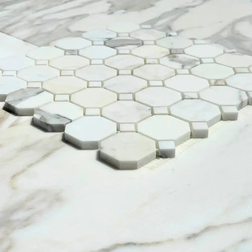 12x12 Calacatta Gold octagon mosaic tile showcasing elegant veining on marble surface.