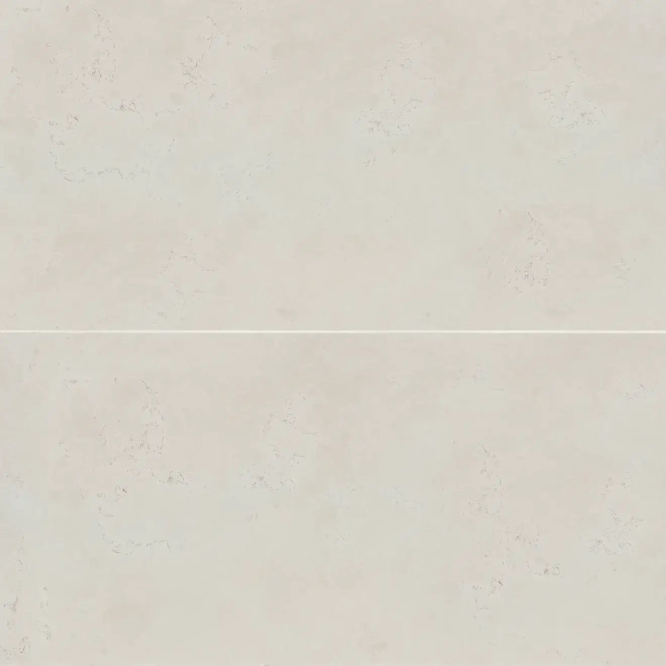 Thaddeus White 24x48 matte R11 anti-slip porcelain tile showcasing a smooth, light surface ideal for moisture-prone areas.