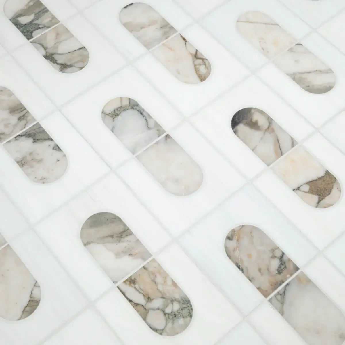 Bianco Dolomite Green polished marble mosaic tile featuring modern geometric patterns and Calacatta green veining.