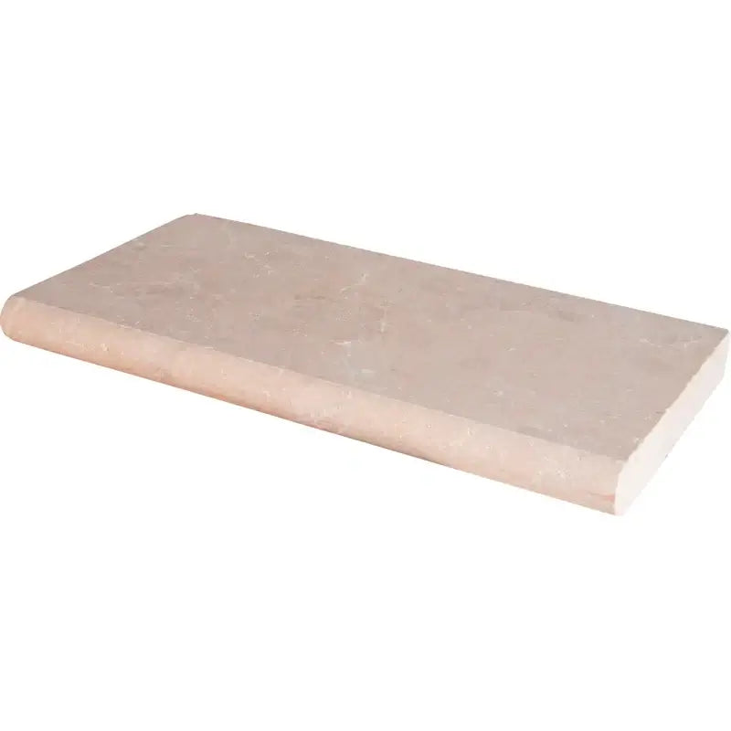 Aegean Pearl 24x16 inch marble tumbled coping stone in warm beige, ideal for outdoor pool design.