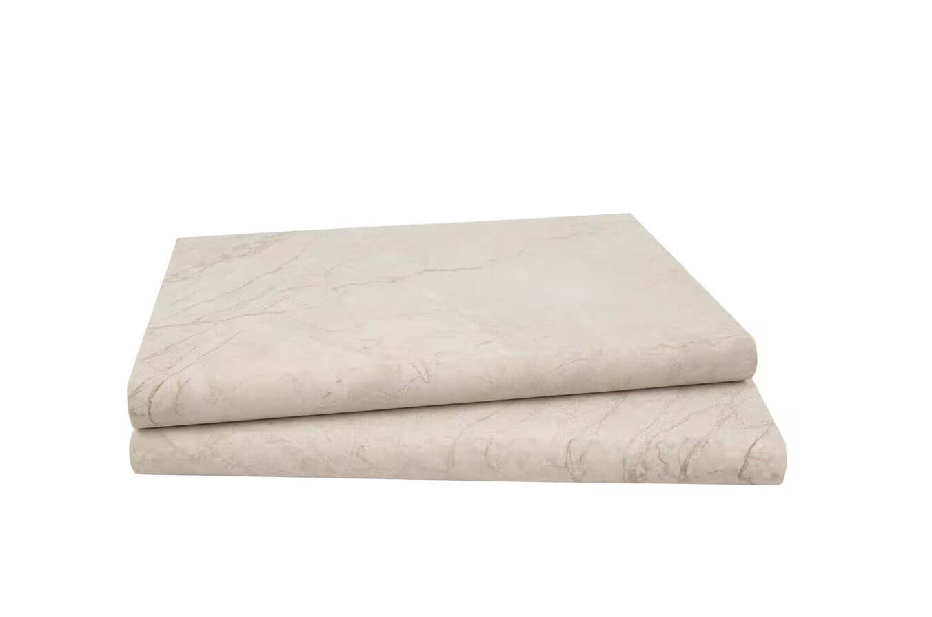 Aegean Pearl marble coping slabs in warm beige tones, showcasing a tumbled finish for elegant outdoor design.