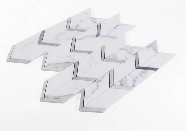 Calacatta Blue Chevron 12 x 12.75 marble tile showcasing a modern arrow pattern with elegant colors.