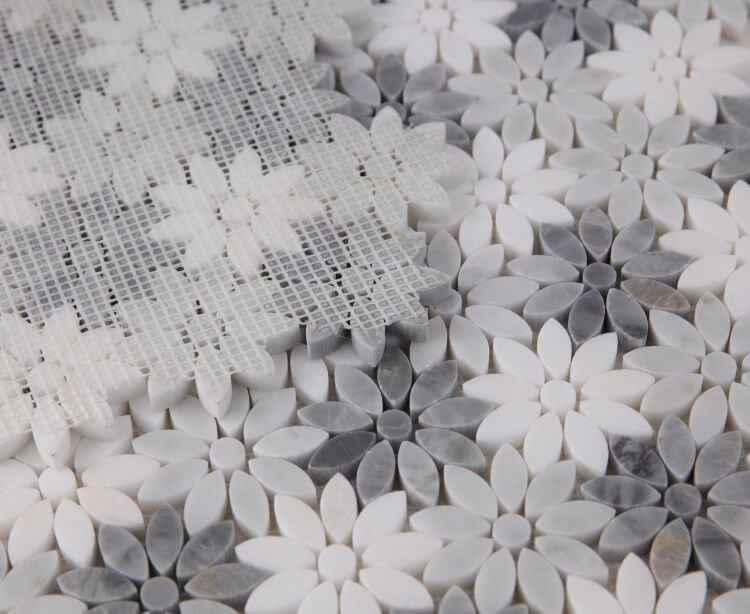 Daisy Wild Grey marble mosaic tiles in a floral pattern, showcasing a mix of white and grey marbles, 12.5 x 13 inches.