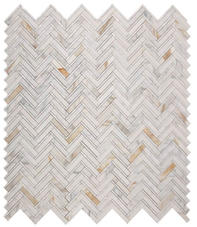 Diana Herringbone Calacatta mosaic tile featuring white and gold marble pattern in a chevron design.