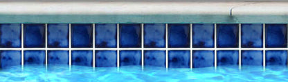 Fujiwa Tile VIP 3x3 Series Marble Blue Mosaic for pool edges, showcasing elegant blue tones in a water environment.