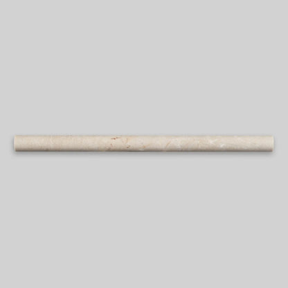Polished Spanish Crema Marfil marble pencil liner, 1/2 x 12 inches, ideal for elegant tile borders and design accents.