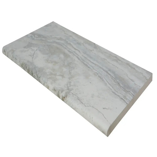 Argento Travertino 13x24 matte porcelain pool coping showcasing a natural stone look in a stylish grey hue.