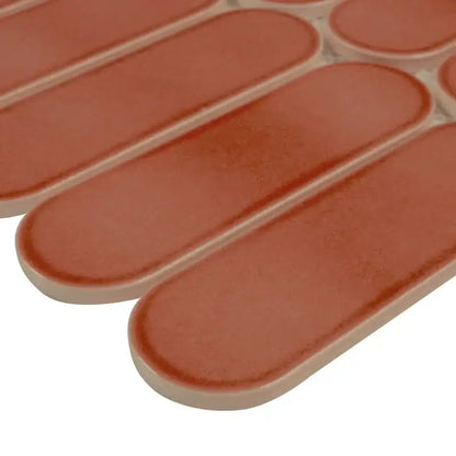 Terra Ellipse 12x12 glossy glass mosaic wall tile in vibrant earthy tones with a modern ellipse design.