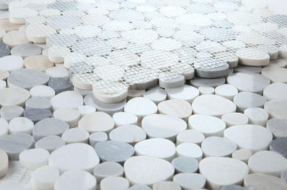 Close-up of Aphrodite Beach 12x12 mosaic tiles with heart-shaped pieces in Palissandro White, Blue, and White Thassos marble.