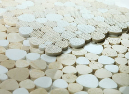 Close-up of Aphrodite Marfil 12x12 mosaic tile featuring polished heart-shaped marble pieces in white and beige.