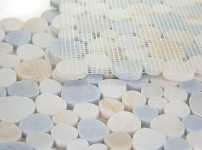Aphrodite Marina mosaic tiles featuring polished white and blue marble pebbles in various shapes and sizes.