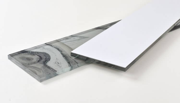 Aura Shell Grey 4x24 glass tile showcasing elegant grey and white design, ideal for indoor installations.