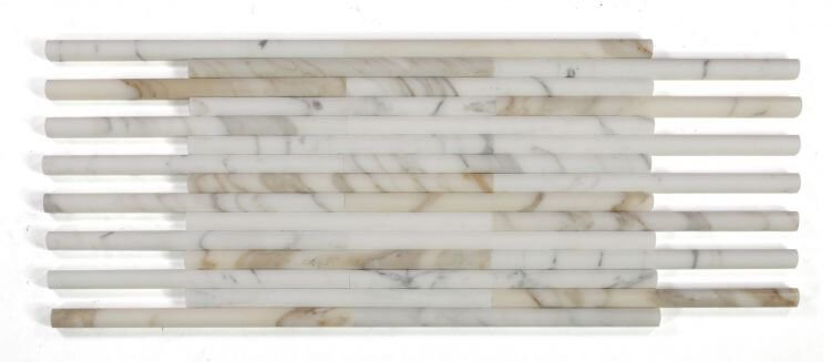 Calacatta Gold honed marble pencil trim, .75 x 12, featuring a stunning white and gold linear design.